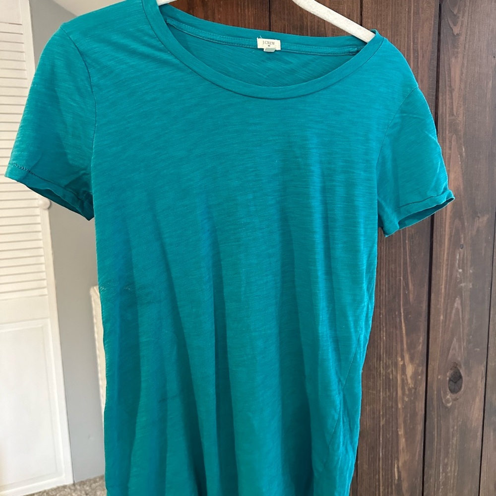 Beautiful turquoise cotton tee shirt like new condition.